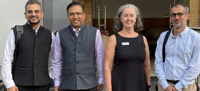 Mairead stands outside the ORF offices with Sagar Vishnoi, Niranjar Sahoo & Rahul Batra